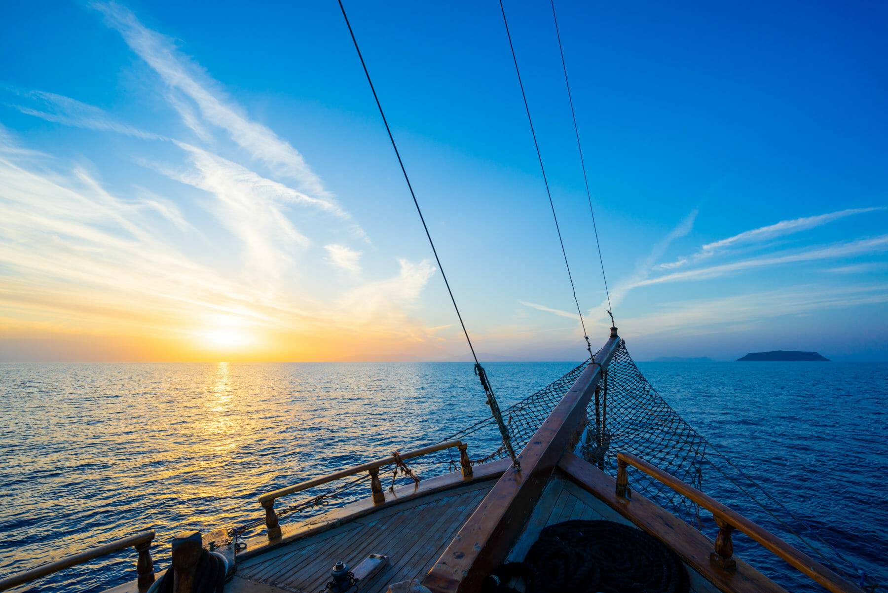 Sunset at the Sailboat deck while cruising in the Cyclades in Greece